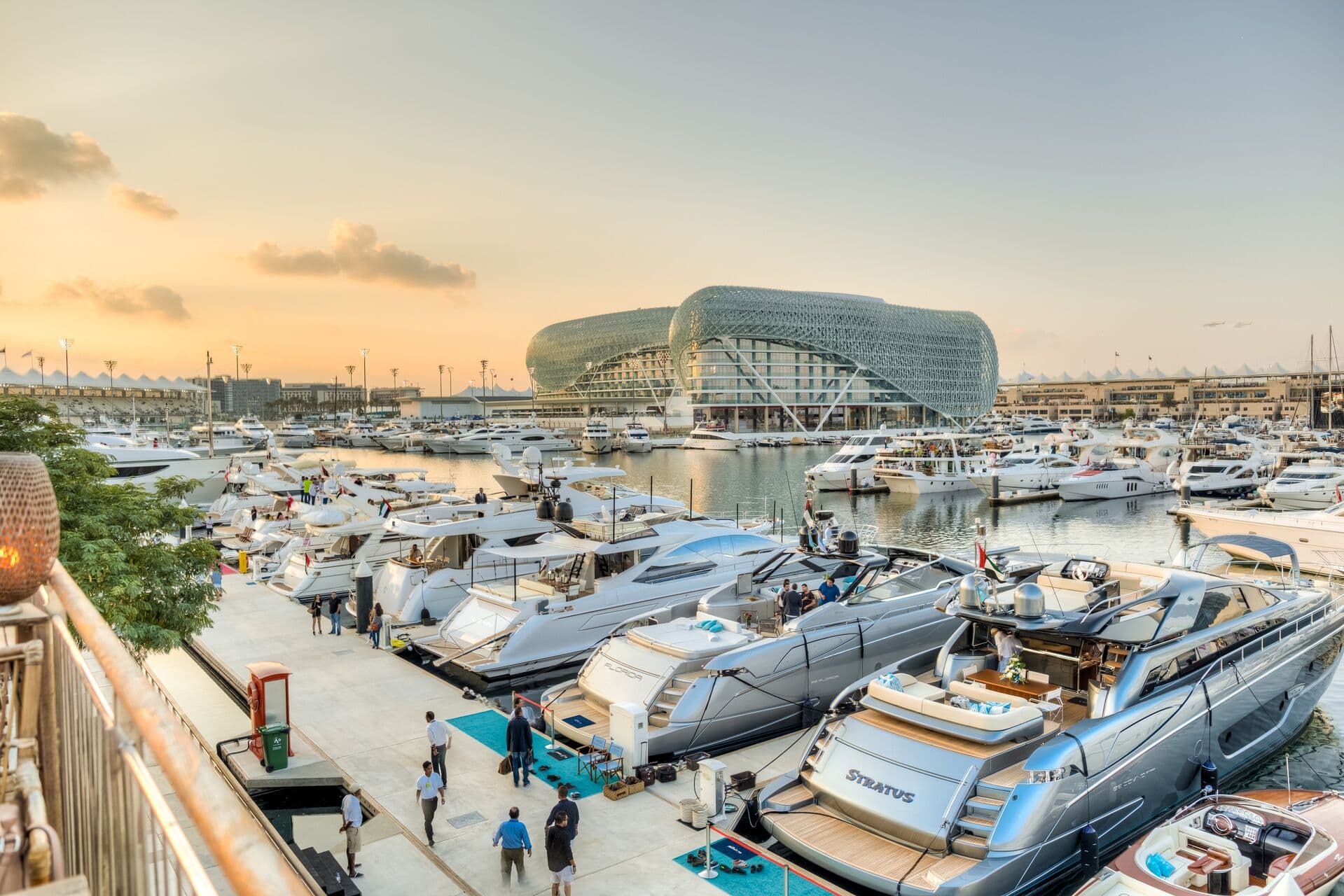 Yas Marina at sunset with iconic Yas Viceroy Hotel and luxury yachts
